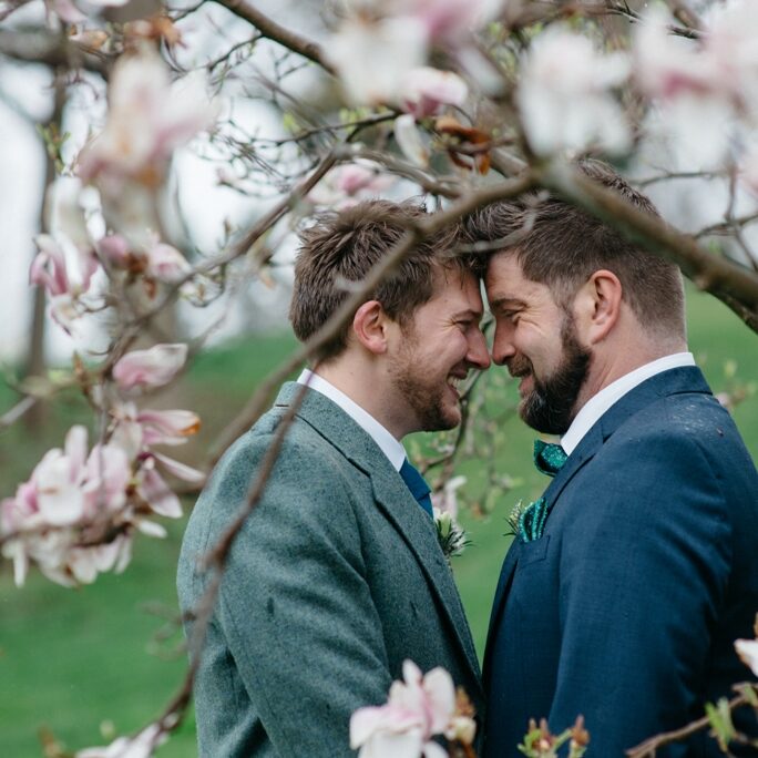 gay couple eloping in the park, LGBT weddings Michigan
